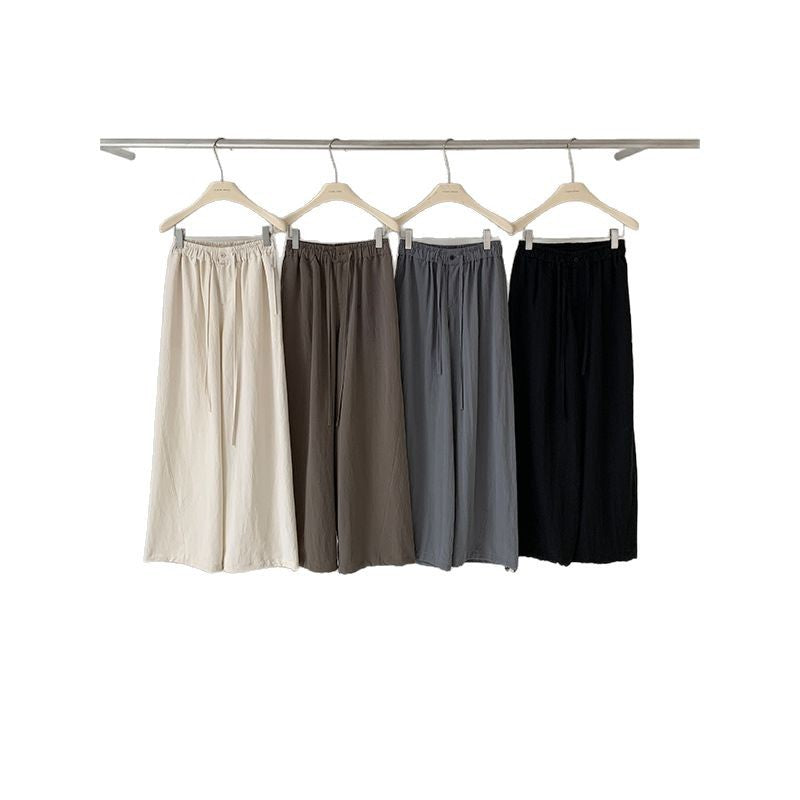 Dame bred stofbuks med elastisk talje og justerbar snor Stilla