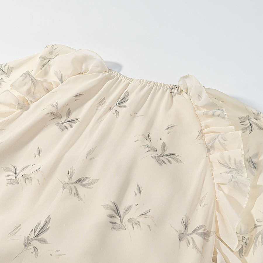 Dame maxikjole med elegante flæsedetaljer og blomstermønster Skovae