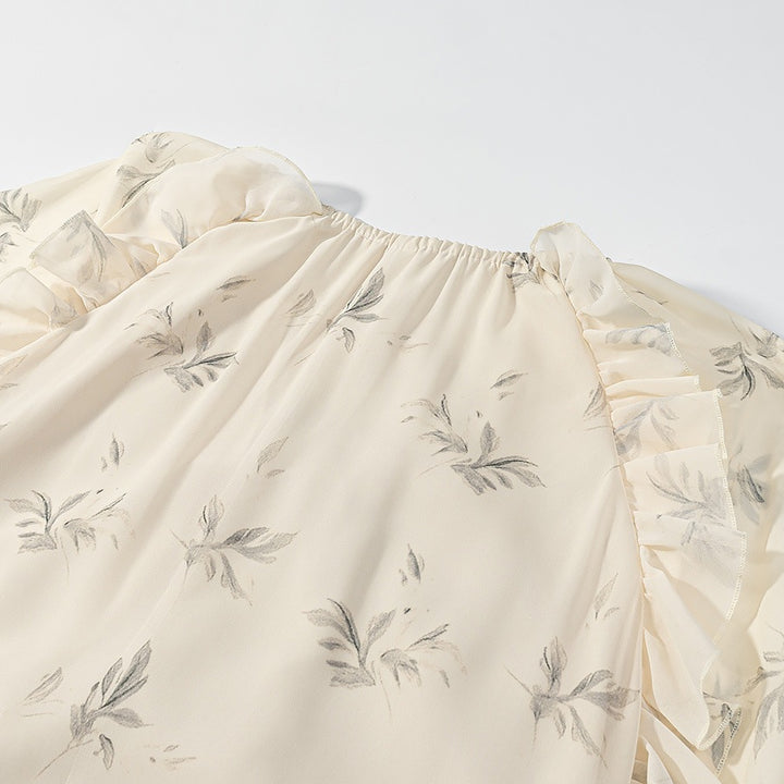 Dame maxikjole med elegante flæsedetaljer og blomstermønster Skovae