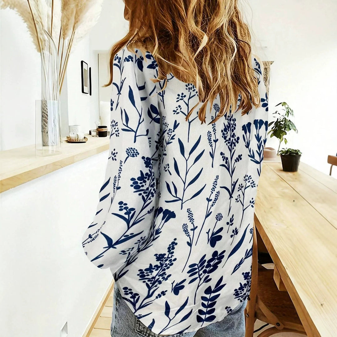 Dame nan loose linen look blouse med V-hals botanisk alloverprint og trekvartærmer Skovae