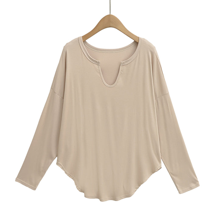 Dame afslappet longsleeve top med dyb v-hals og løstsiddende snit Stilla