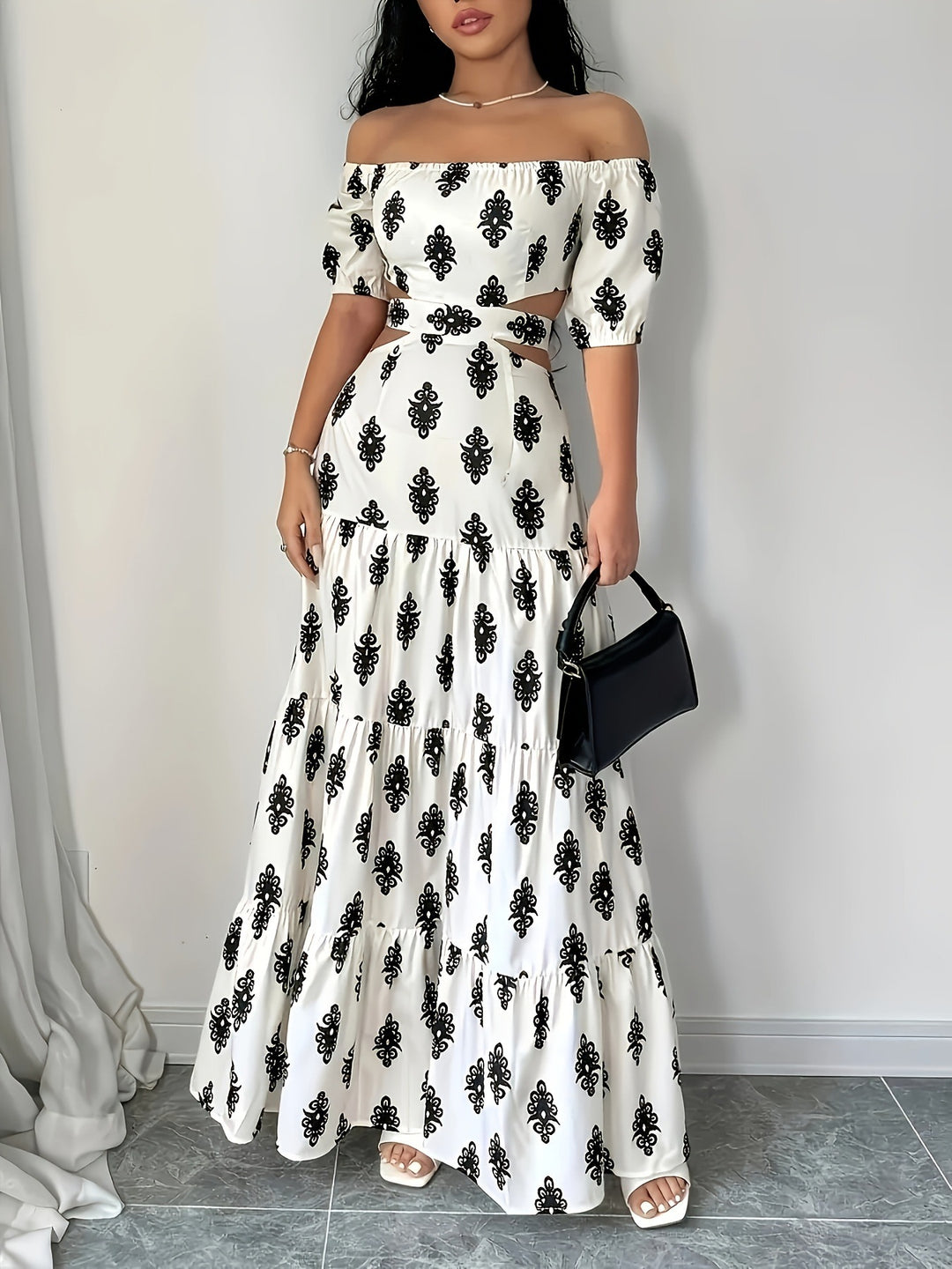 Dame Off-Shoulder Maxikjole med florale mønstre og voluminøs kant Stilla