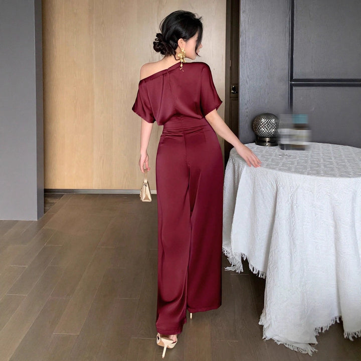 Dame Én skulder jumpsuit med bred ben og elegant snit Skovae