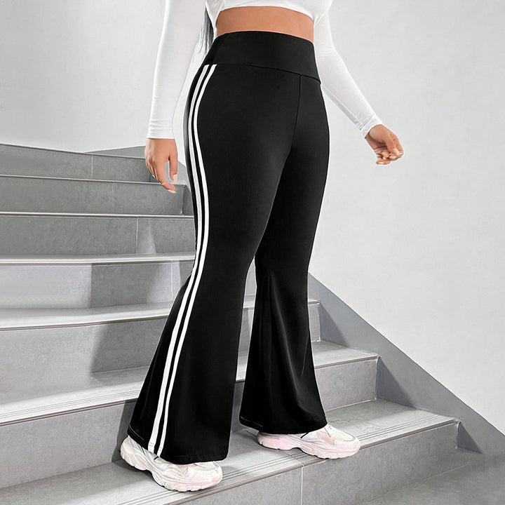 Damer Sporty Flared Leggings med elastisk talje og sidelange striber Stilla