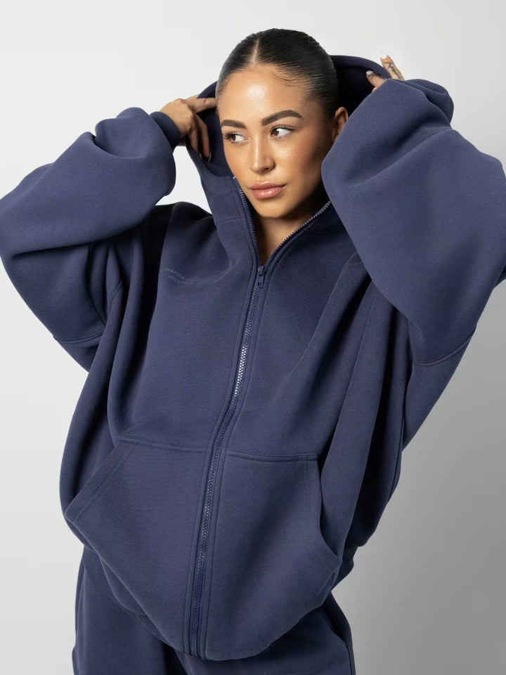 Kvinders sporty fleece-sæt med høj krave og praktiske lommer Skovae