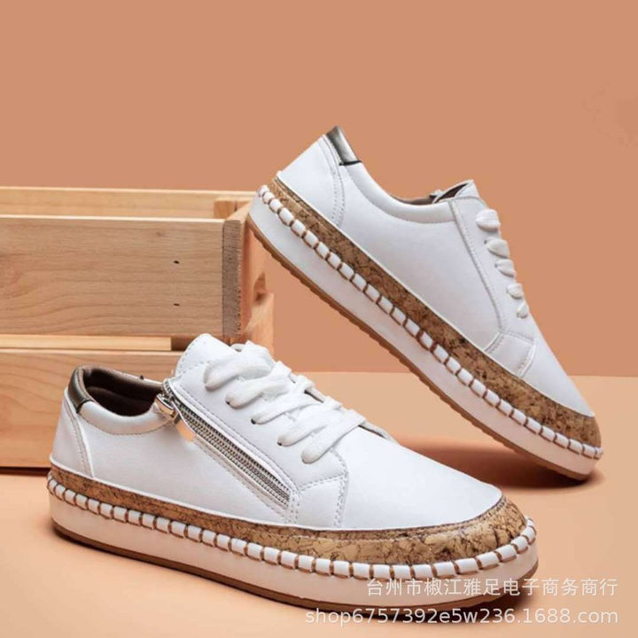 Dame sneakers med moderne blomsterbroderi og komfortabel lynlås Stilla