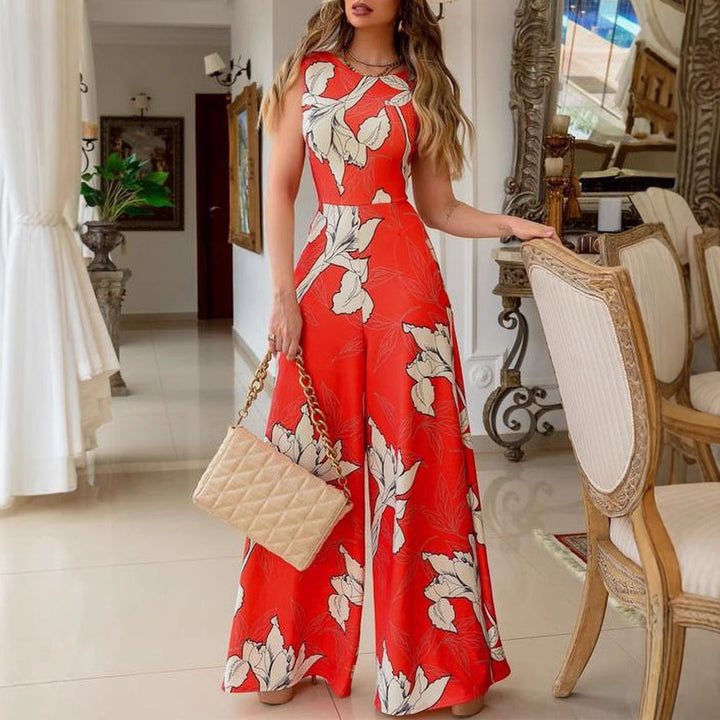 Kvinders stilfulde jumpsuit med blomsteraccent og brede ben Skovae