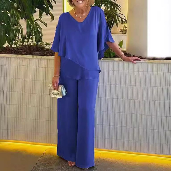 Dame elegant to-delt outfit med flydende snit Stilla