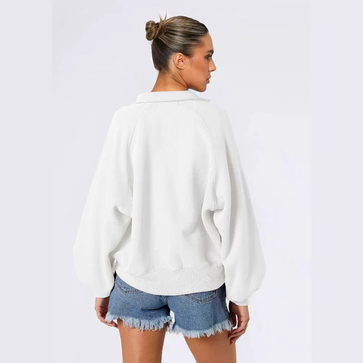 Dame afslappet poloshirt med kortærmet pufærme-version og lukkede knapper Stilla