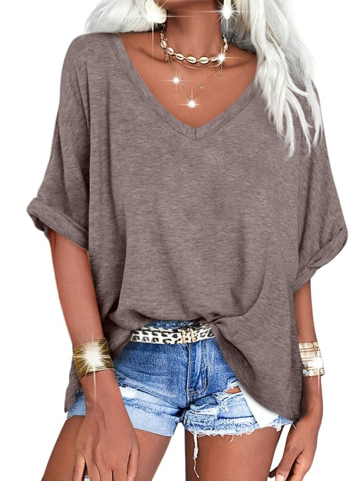 Dame afslappet V-hals T-shirt med oversized snit og plisseret detalje Stilla