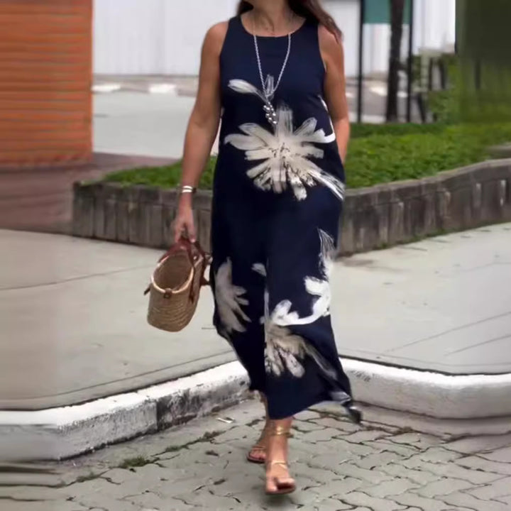 Dame maxikjole med blomsterdesign og sidelommer Stilla