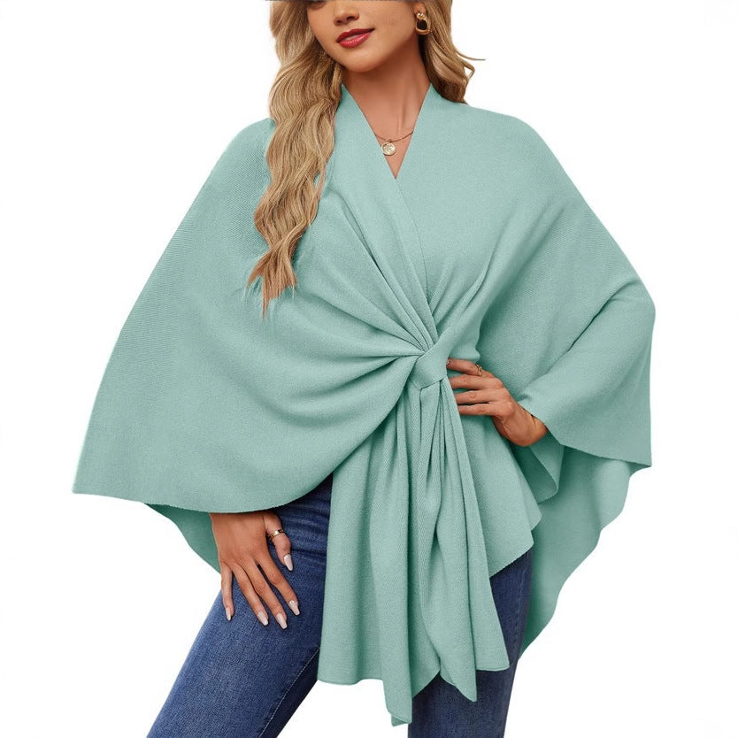 Dame elegant strikkeponcho med raffinerede draperinger og taljebælte Stilla