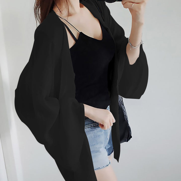 Damer elegant kimono jakke med en løs pasform og detaljeret designede ærmer