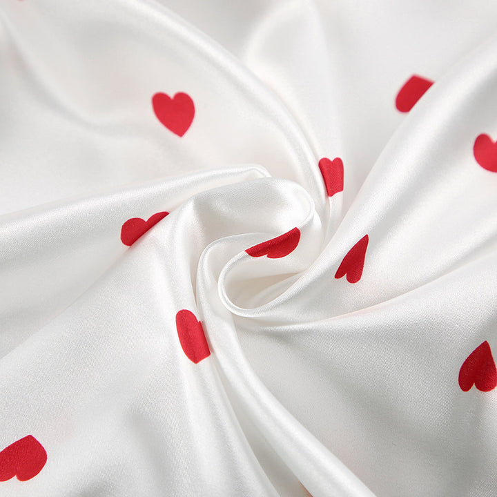 Dame pyjamasæt med hjerteprint i åndbart materiale Stilla