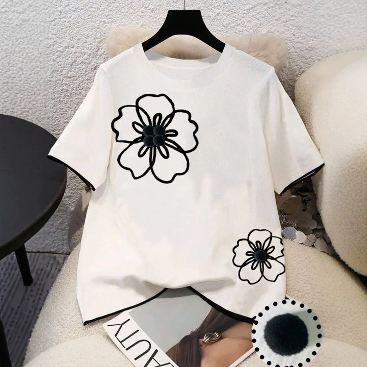 Dame T-shirt med blomstret design og løs pasform Skovae