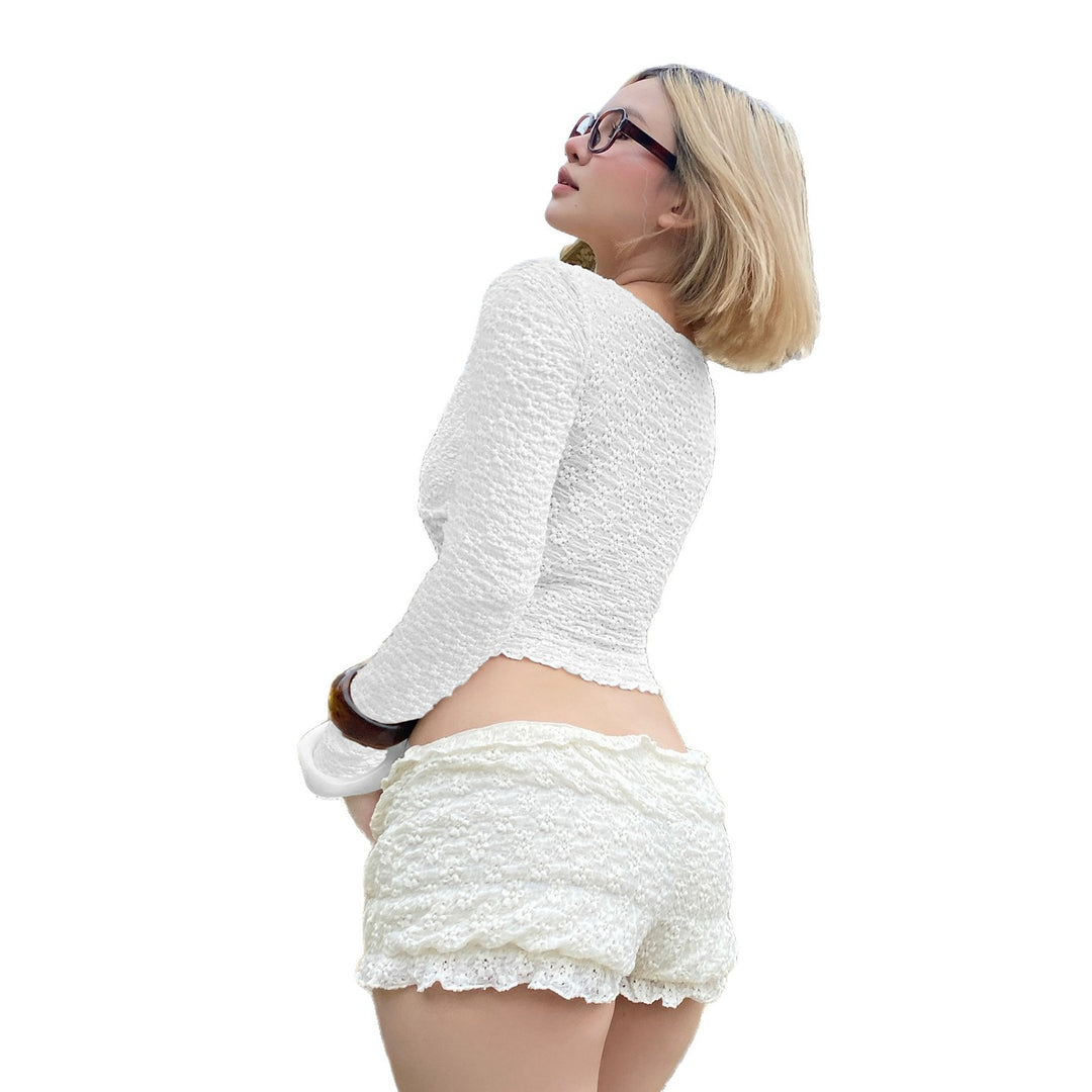 Dame blonder top med smart snørelook og lange ærmer Skovae