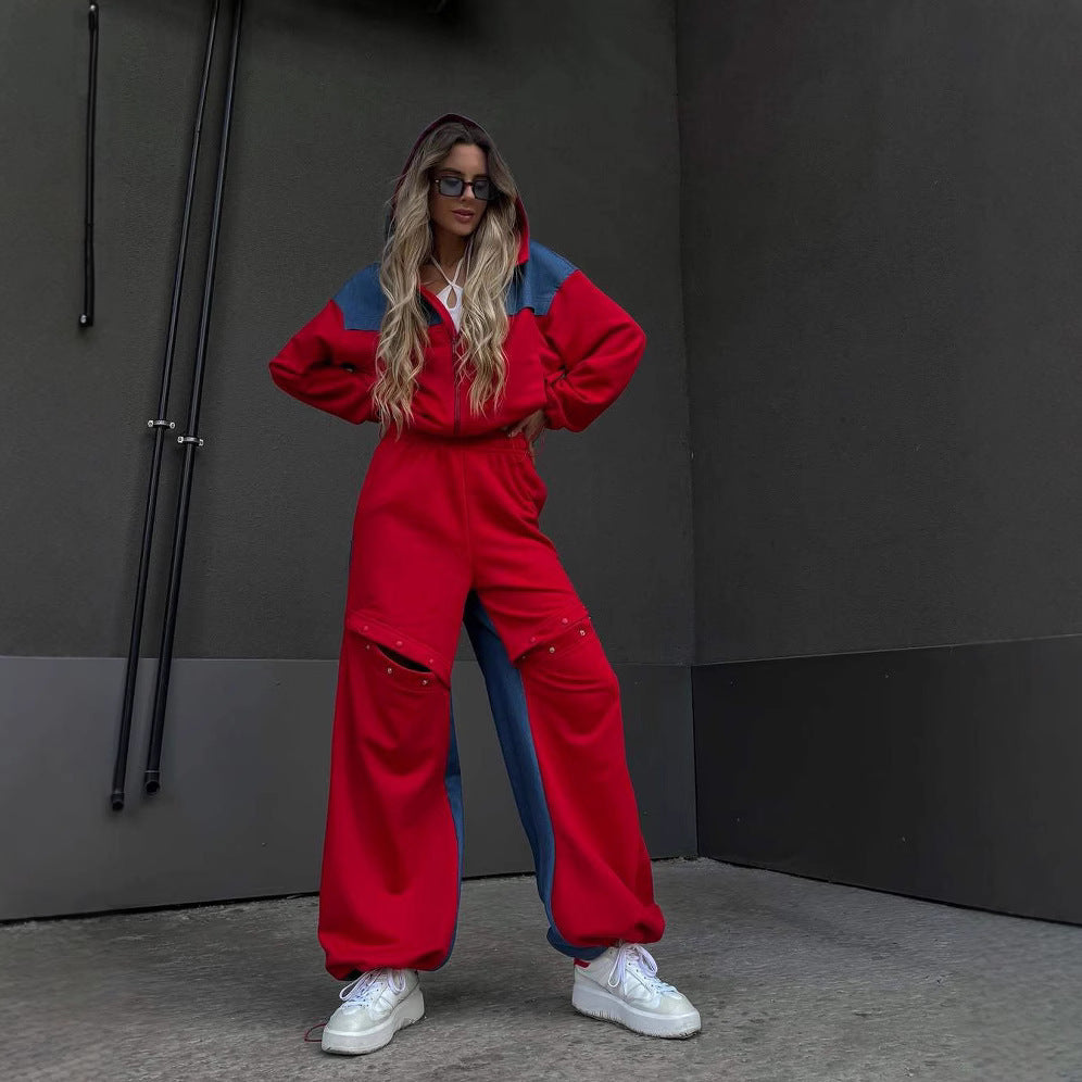 Kvinders fashionable casual outfit med sporty jakke og kreativt udskårne bukser Skovae