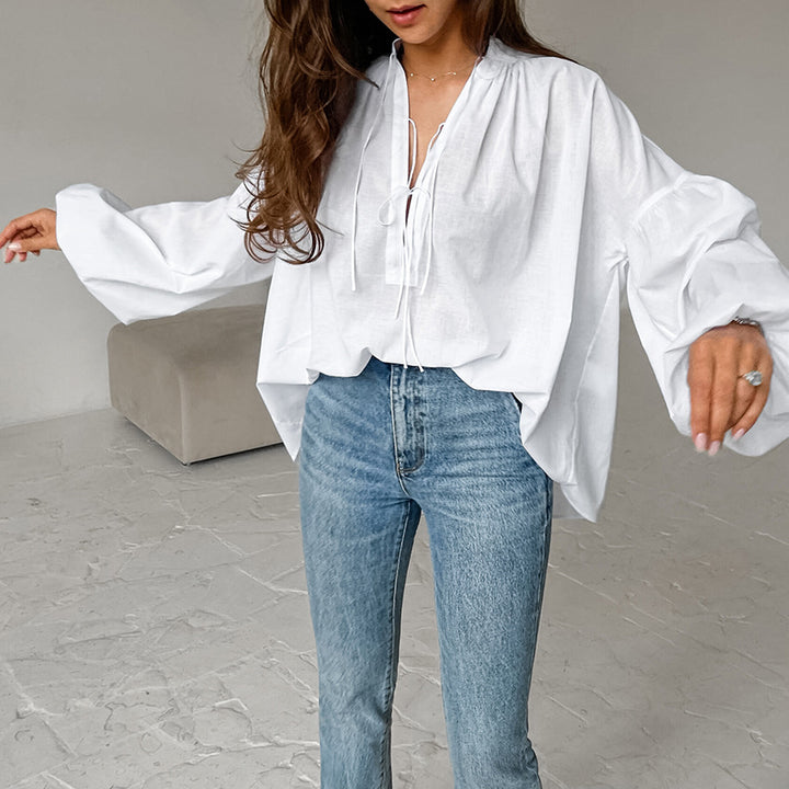 Damebluse med voluminøse ærmer og elegant snøring Stilla
