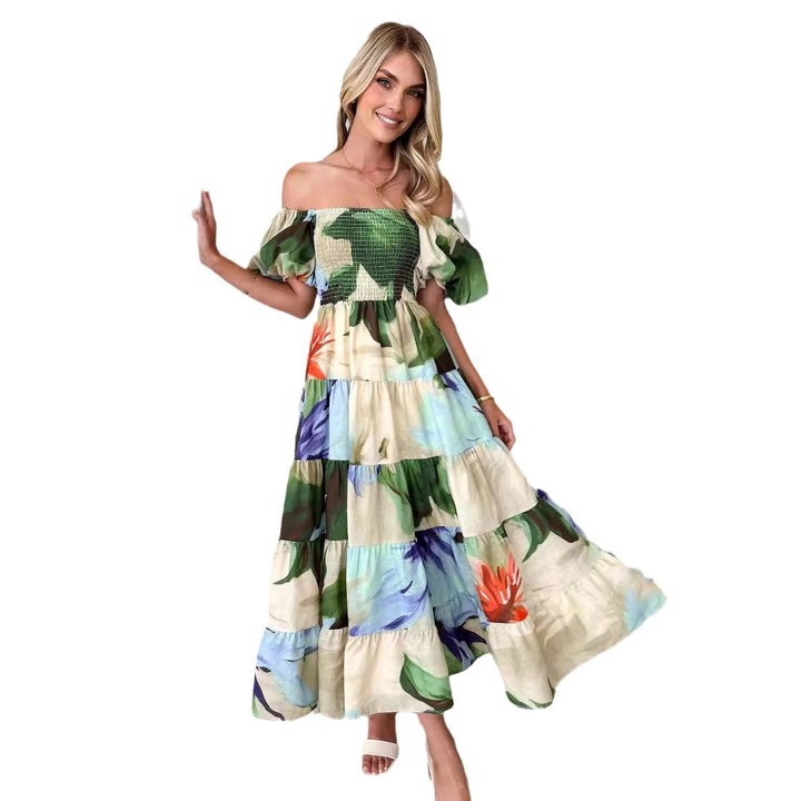 Kvinders maxikjole med off-the-shoulder design og voluminøse puffærmer Stilla