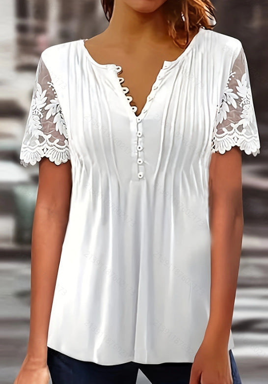 Damebluse med spidse detaljer og plissering Stilla