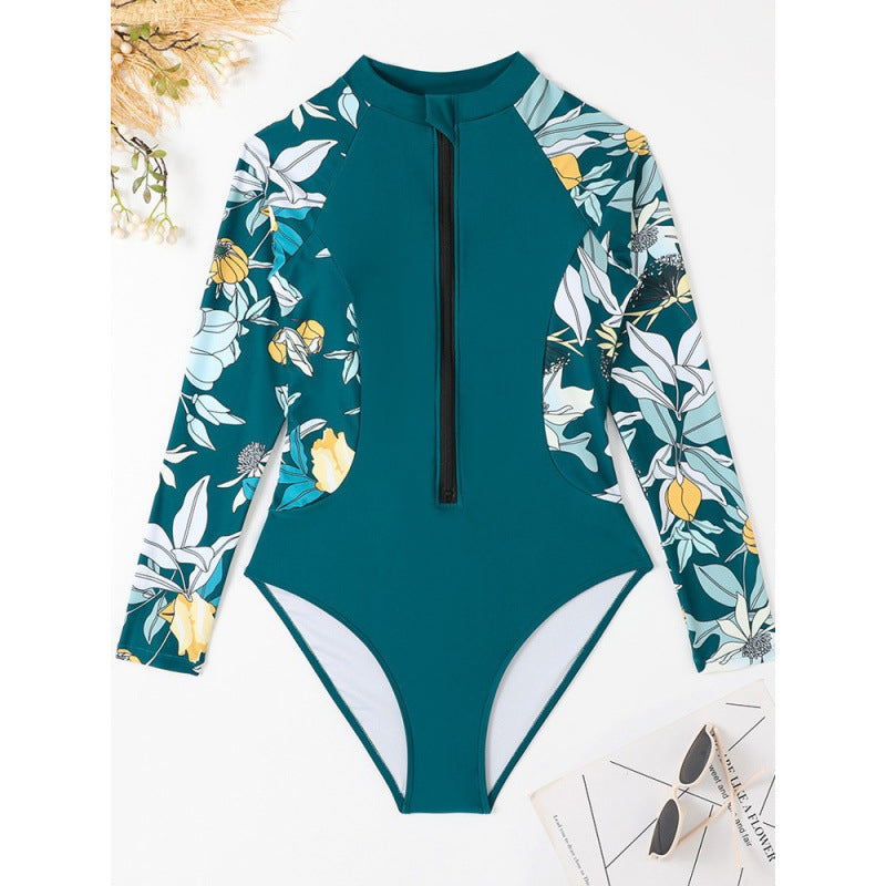 Dame surfdragt med blomsterdesign og sporty lynlås Skovae