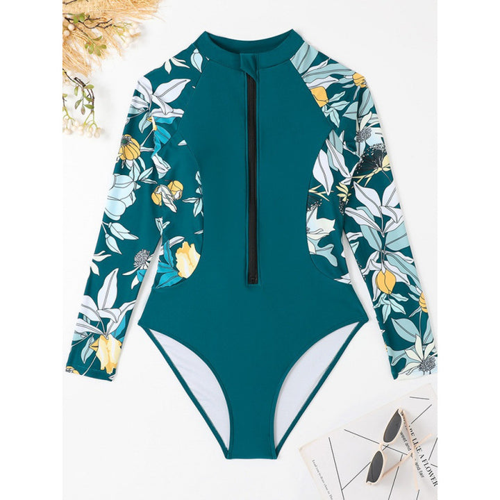 Dame surfdragt med blomsterdesign og sporty lynlås Skovae