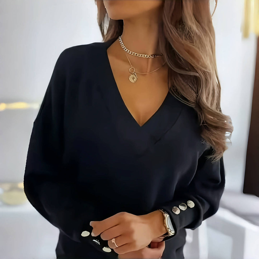 Dame elegant V-hals bluse med dekorative knapdetaljer Stilla
