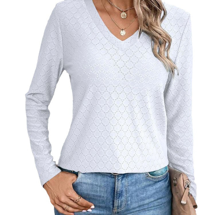 Dame V-hals bluse med vævet huldesign og elegante ærmer Stilla