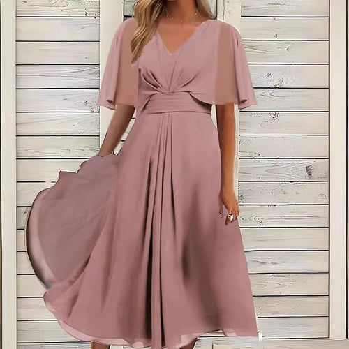 Dame Midikjole med svajende skørt og elegante flæseærmer Stilla