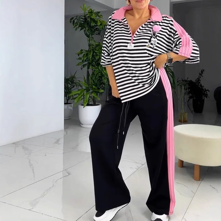 Dame overdimensioneret polo T-shirt med stribet design og modige accenter Stilla