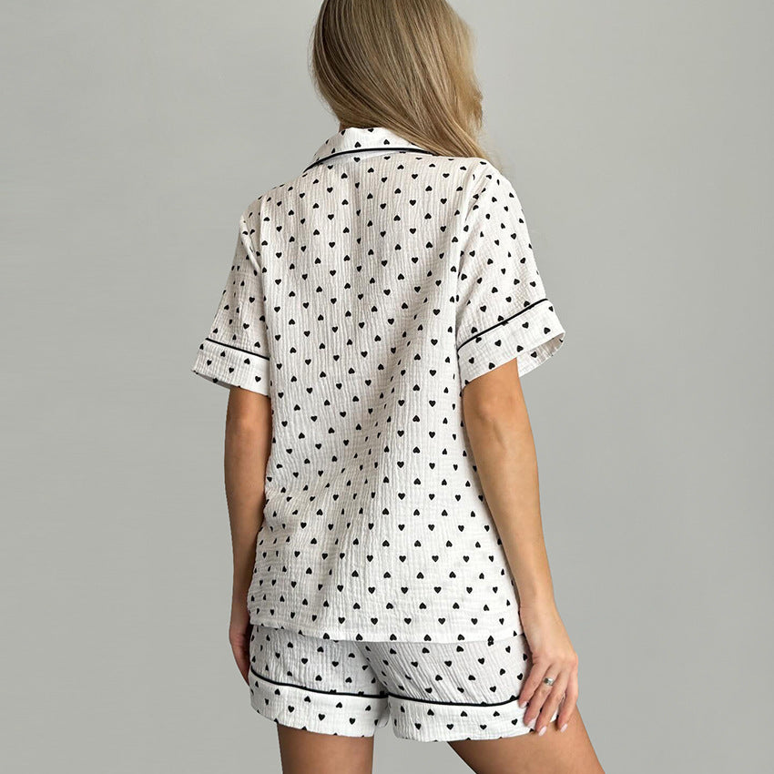 Dame kortærmet pyjamasæt med hjerteprint og elegant design Stilla