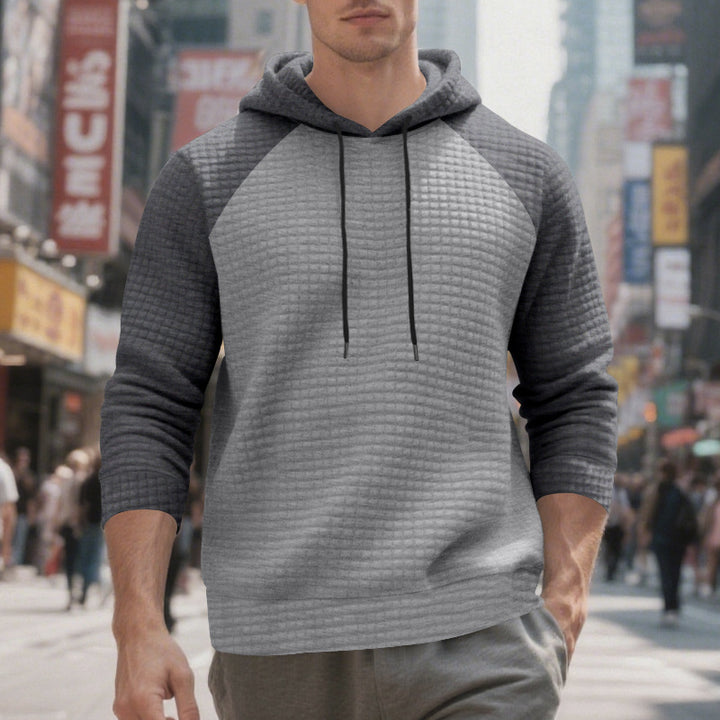Herre nan quilted hoodie med raglanærmer og snoretræk Skovae