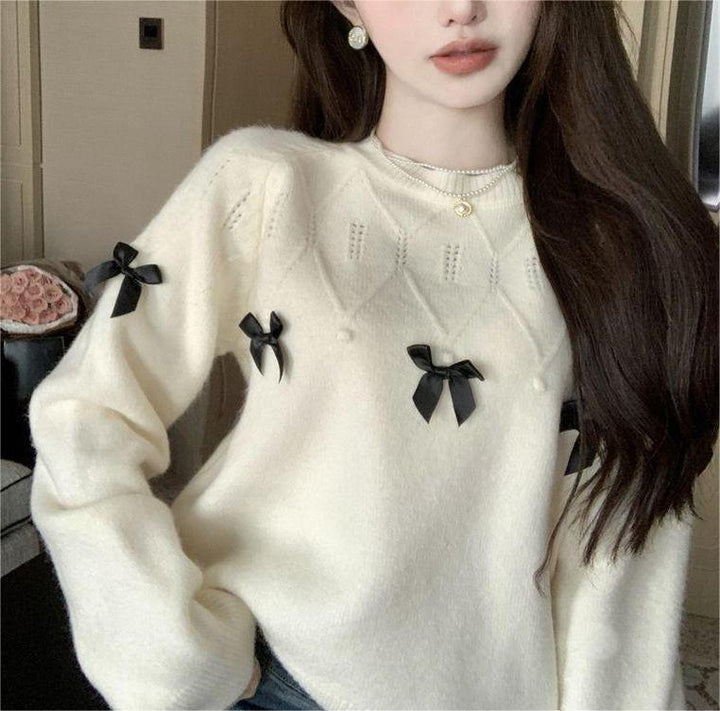 Kvinders hyggelige sweater med legende bueapplikationer Stilla