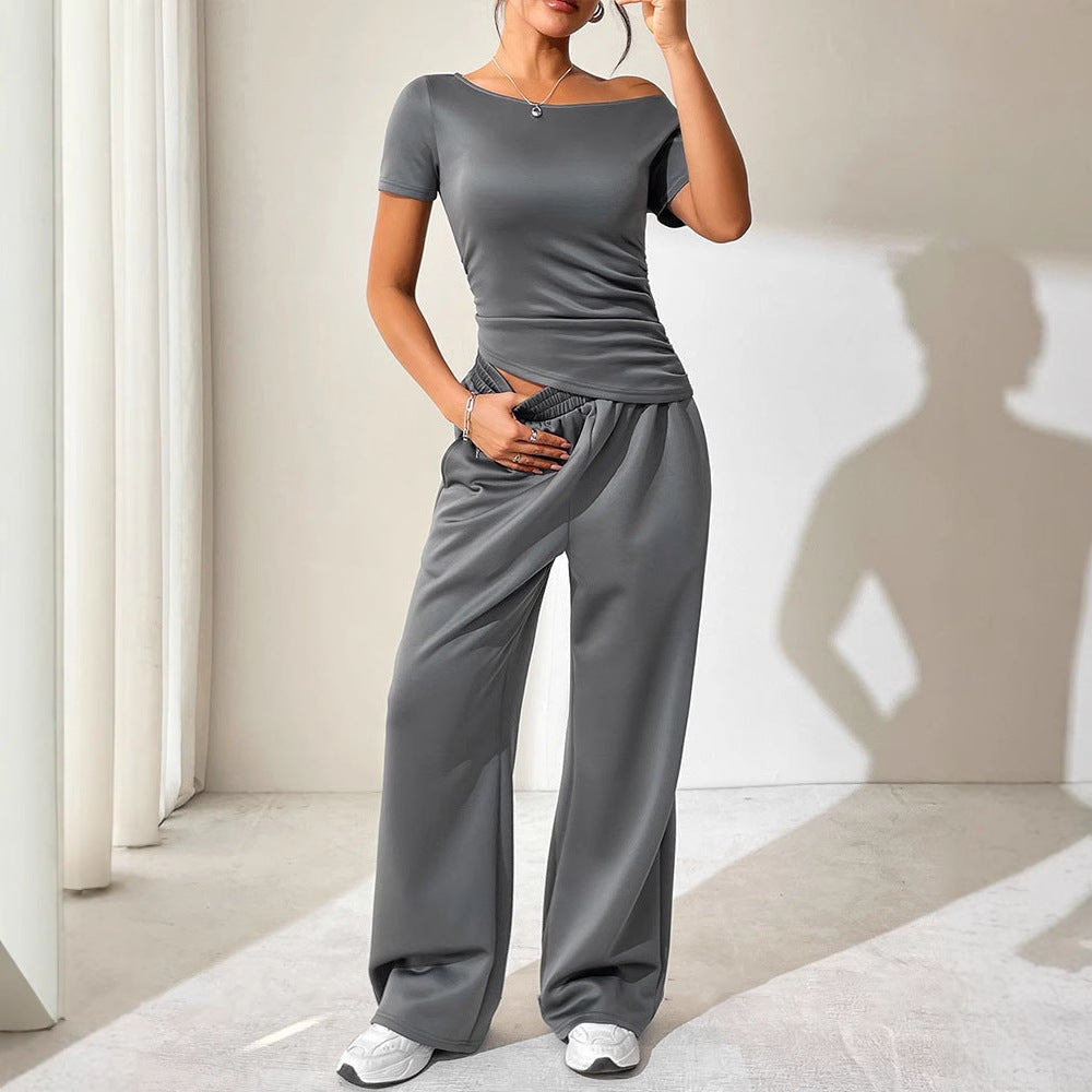Dame jumpsuit med asymmetrisk snit og bredt skåret ben Skovae