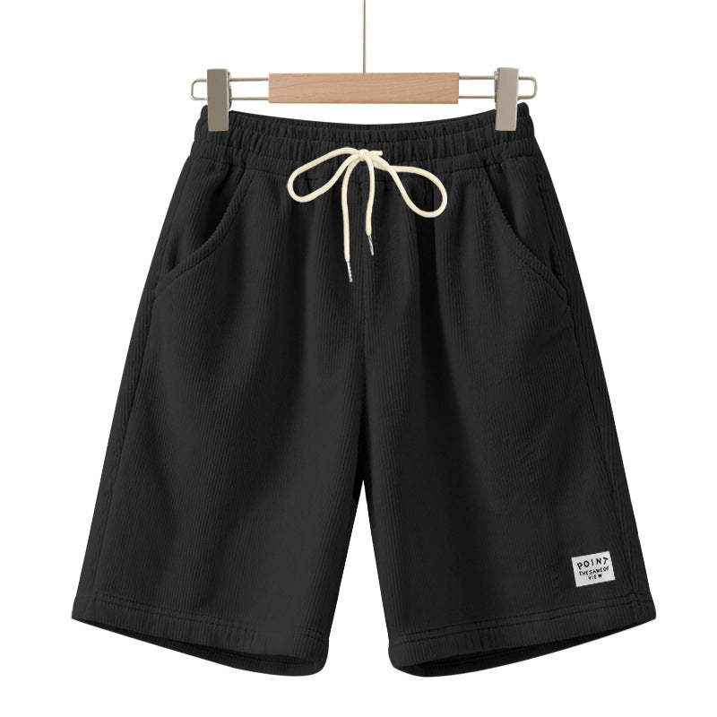 Herre nan knælange Lounge-shorts i ribbet struktur jersey med elastisk snor i taljen og påsyede lommer Skovae