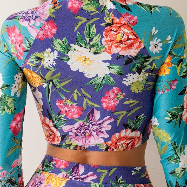 Dame Sporty Badedragt med floral Cut-Out og lange ærmer Stilla