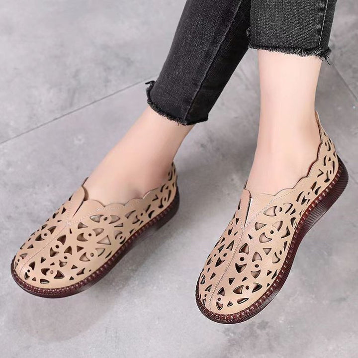 Dame åndbar og moderigtige slippers med elegant snit og gennembrudt design Stilla