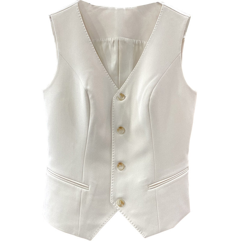 Dame elegant vest med fine guldknapdetaljer Stilla