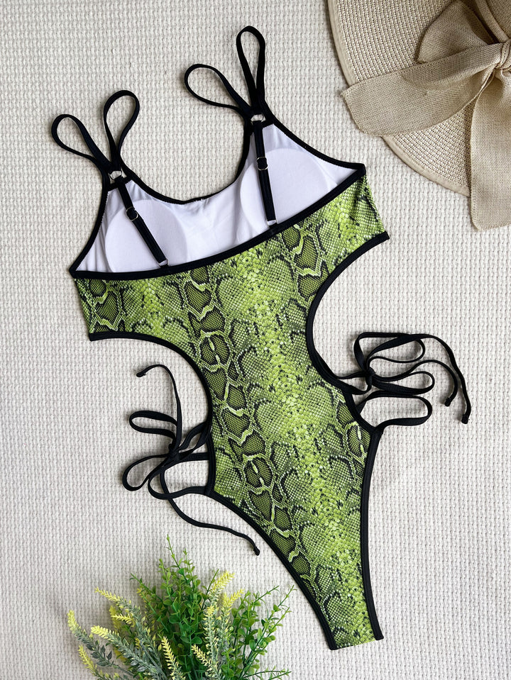 Dame monokini med spændende slangeprint og justerbare snoredetaljer Skovae