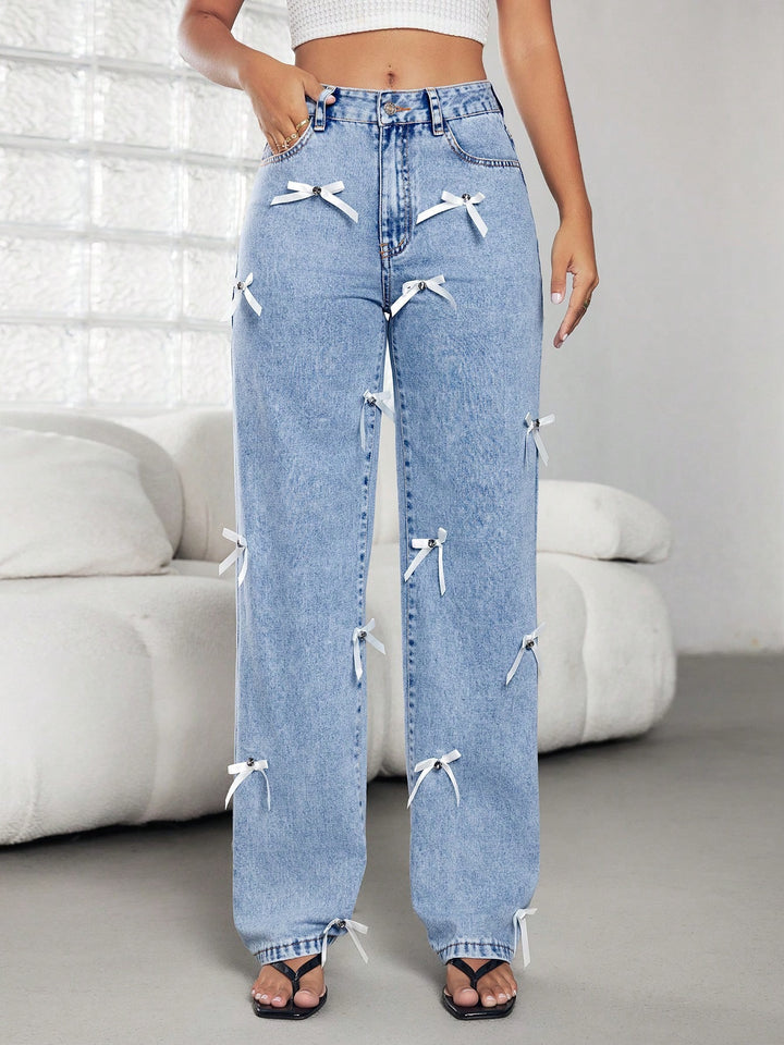 Dame brede jeans med dekorative sløjfer og knapdetaljer Stilla