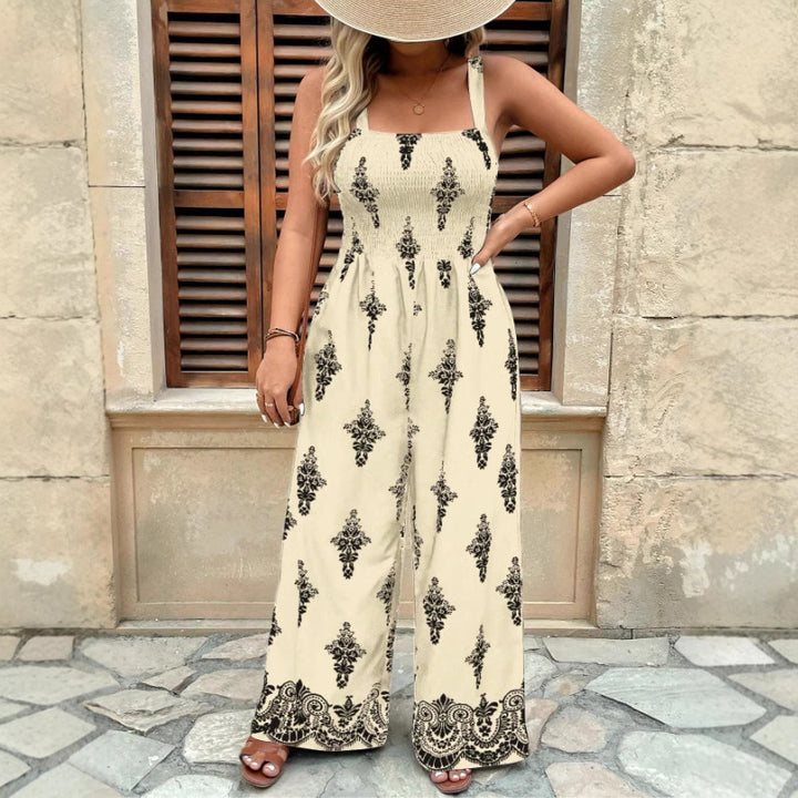 Dame jumpsuit med elegant blomstret design og bredt ben Stilla