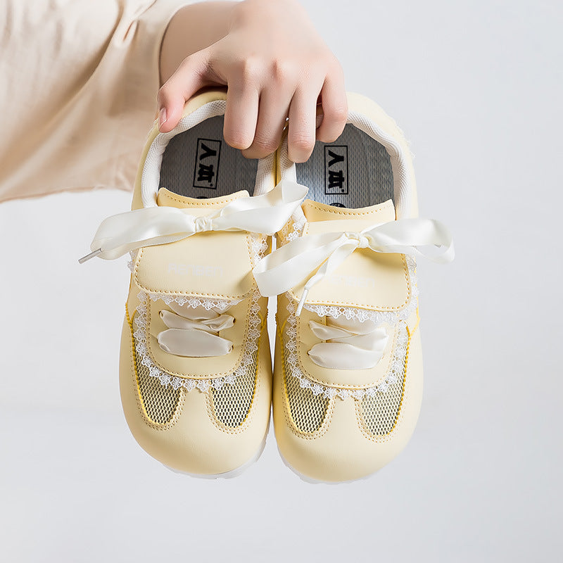 Dame Sneakers i romantisk design med dekorative sløjfer og åndbart mesh-overflade Stilla