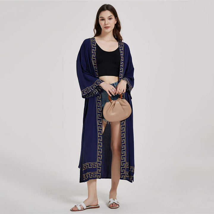 Dame elegant kimono med kunstneriske udsmykninger Stilla