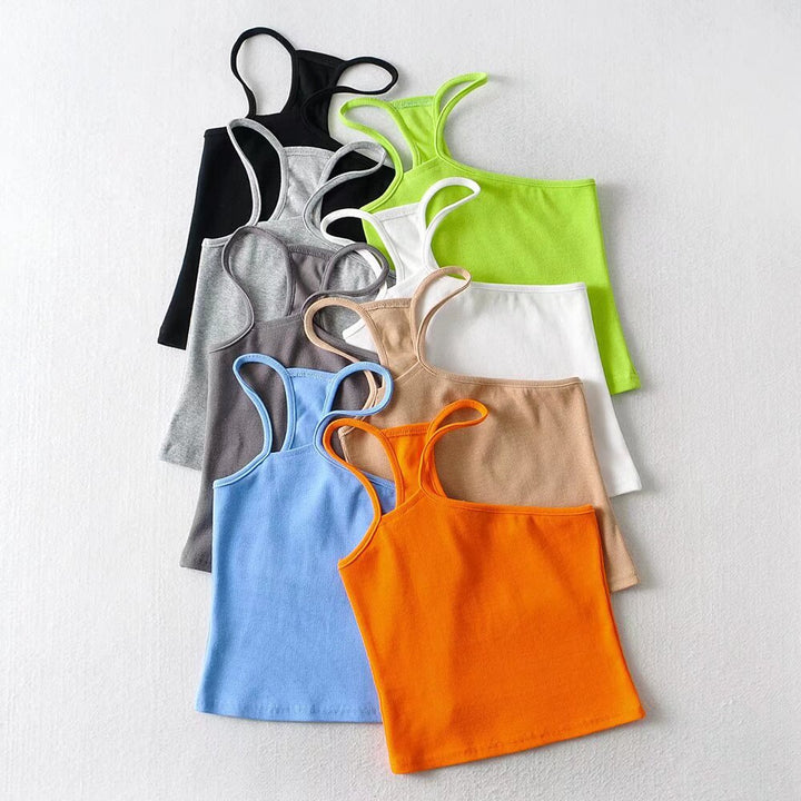 Dame asymmetrisk spaghetti-strop top med smart rippet design og sporty snit Stilla