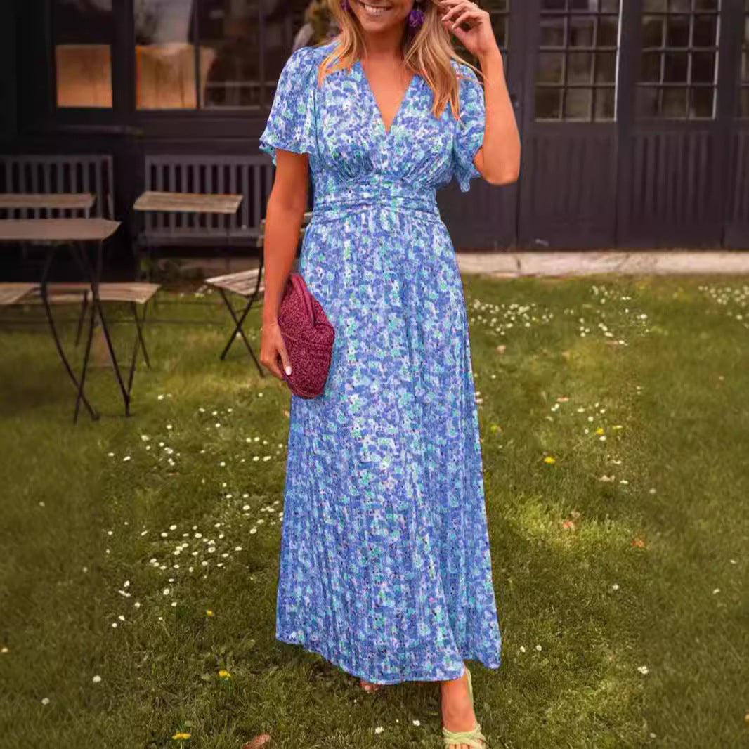 Dame maxikjole med elegant blomsterdesign og dyb V-udskæring Stilla