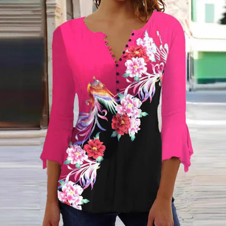 Damebluse med florale accenter og elegante knapdetaljer Stilla