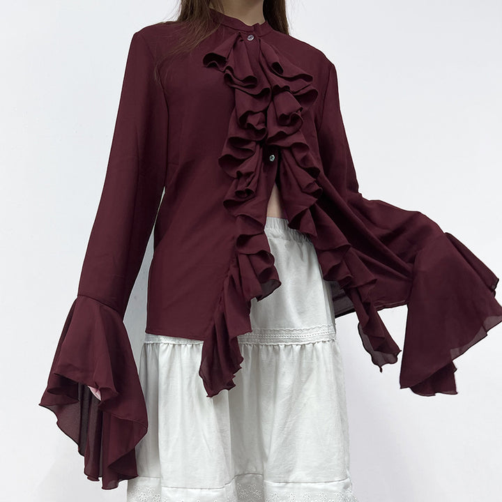 Damebluse med voluminøse ruffles og afslappet snit Stilla