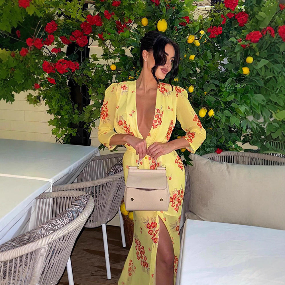 Dame maxikjole med florale applikationer og elegant split Stilla