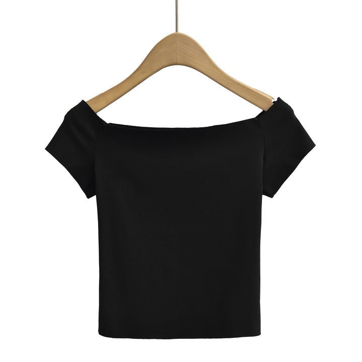 Dame top med smart off-shoulder-design og delikate puffærmer Stilla