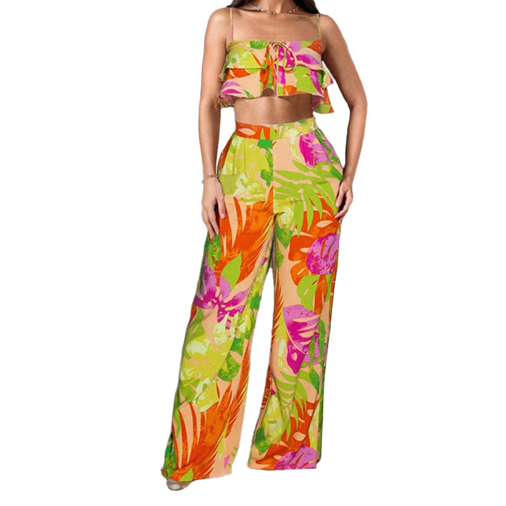 Dame to-delt sommeroutfit med ruffle-bluse og vide bukser Stilla